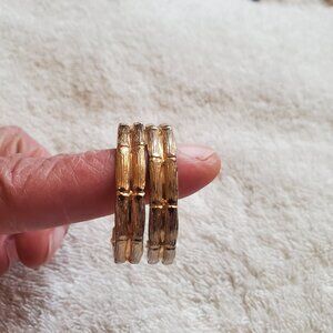 A gold toned pair of pierced earrings, wt . 13 grams,  item # A -76